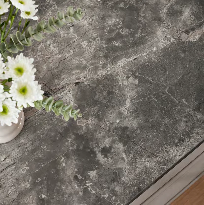 Textured grey surface detail from the Kutchenhaus brochure