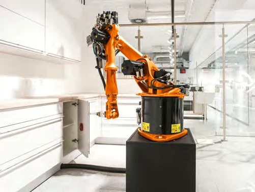 Robotic production equipment in the manufacturer’s factory, shown in the Kutchenhaus brochure