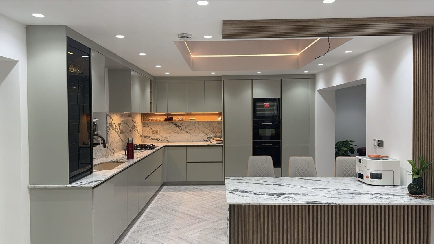 Marble splashback & island run
