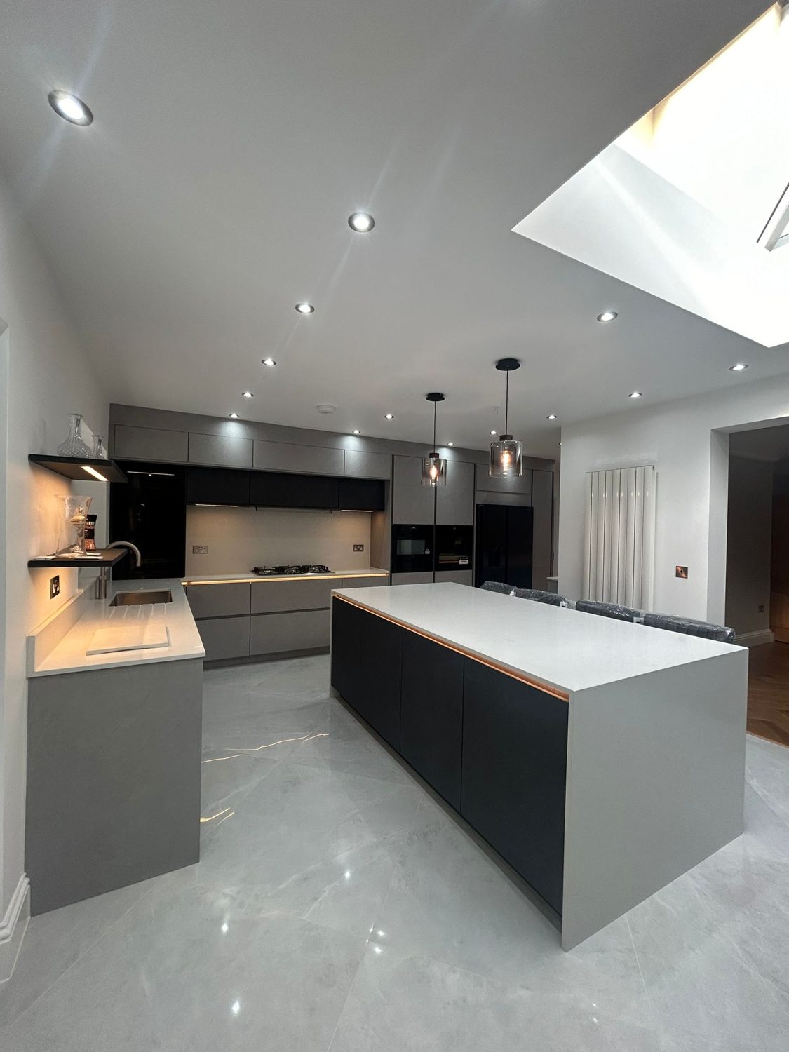 Dark island under a skylight