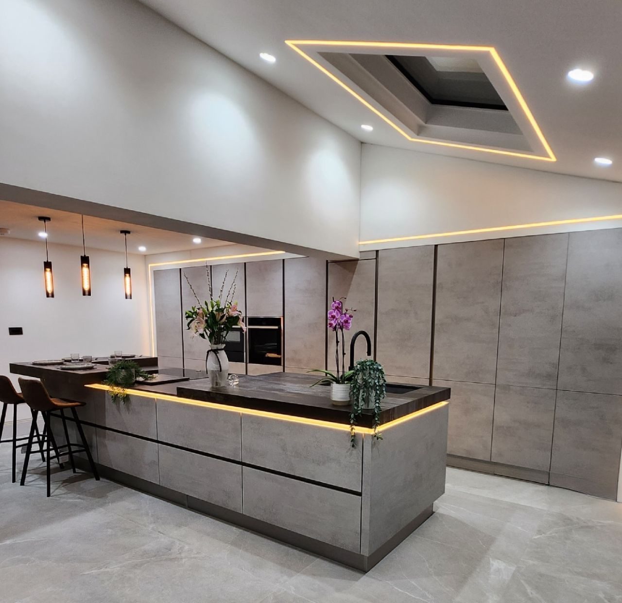 Lit ceiling panel over island