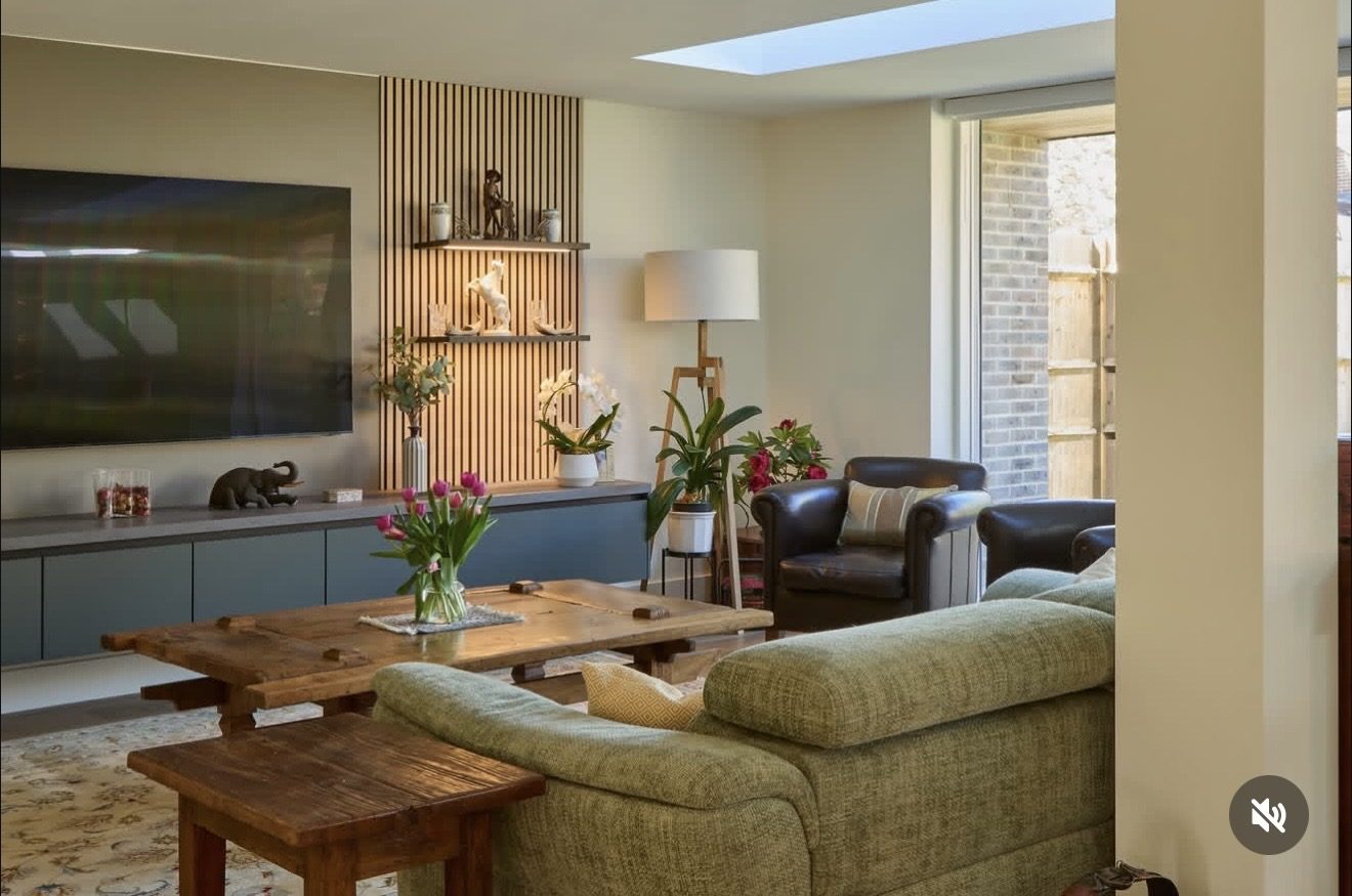 Open-plan living with oak slat wall
