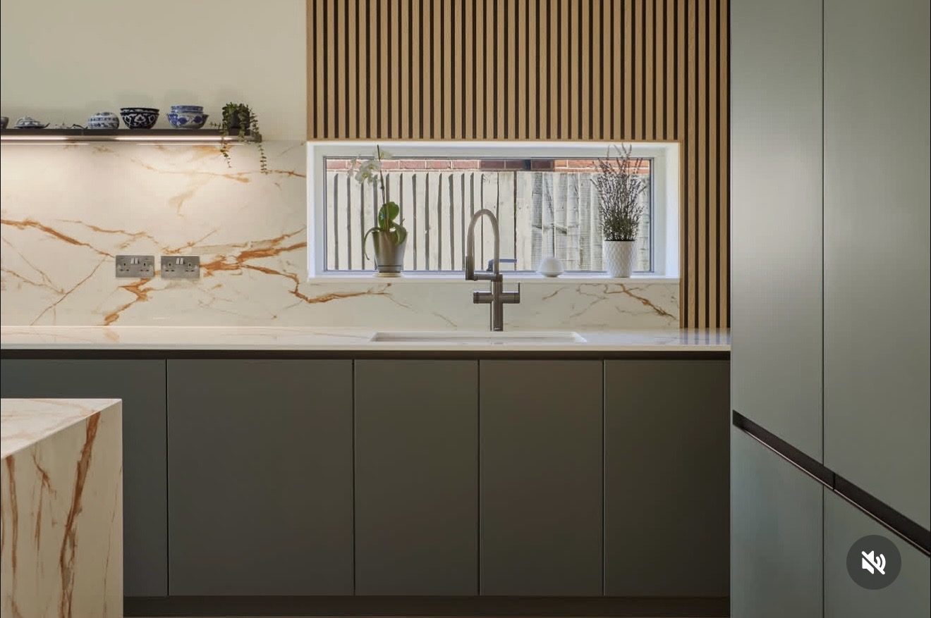 Marble splashback with oak slat backdrop