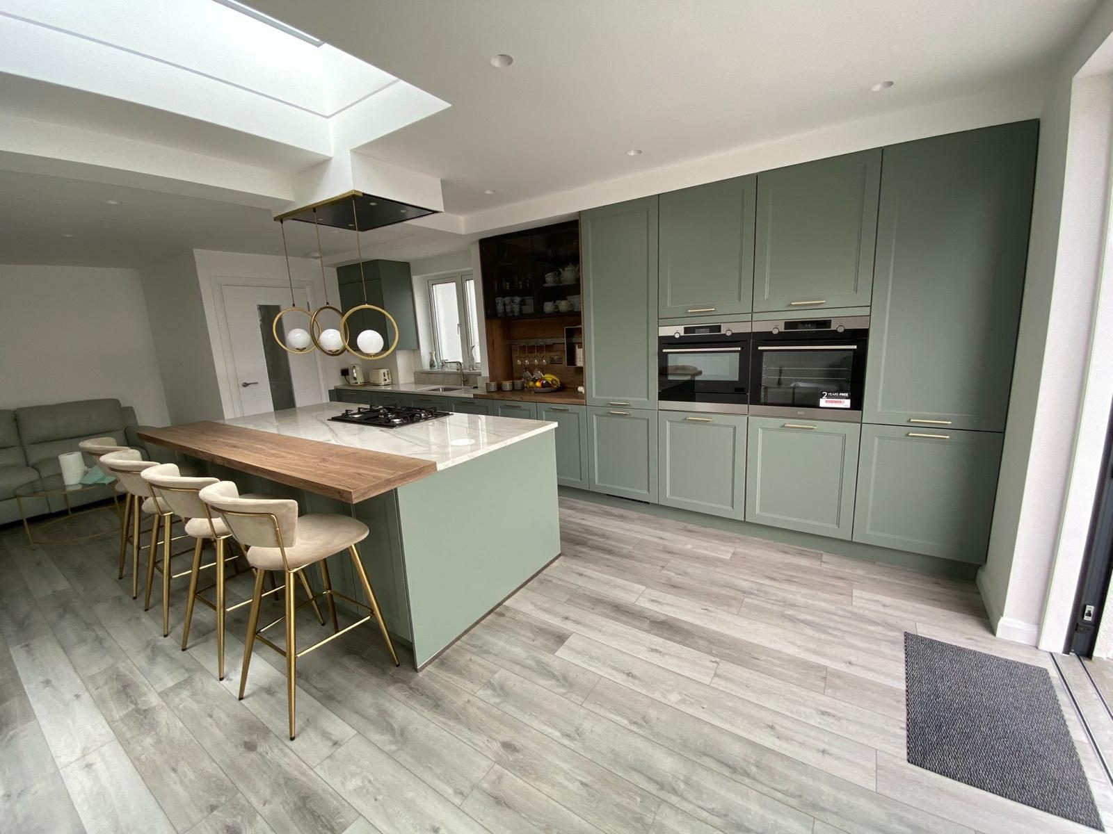 Sage shaker with oak-topped island