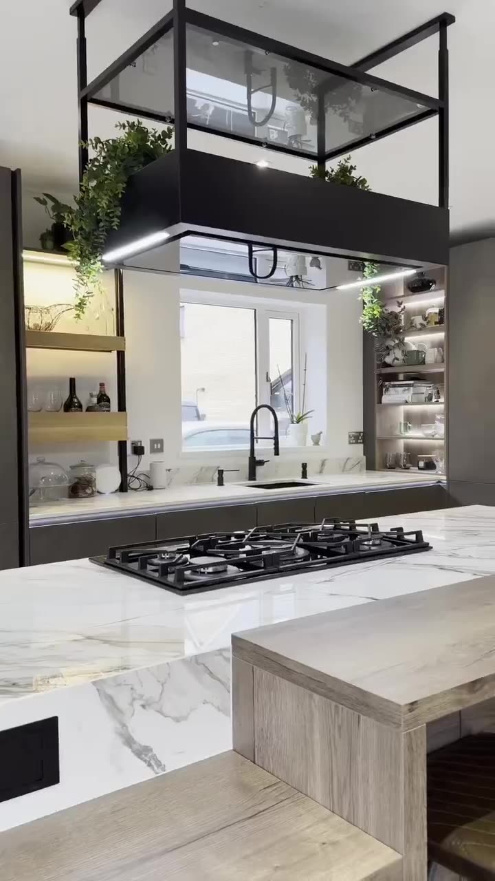 Marble island with black steel shelving